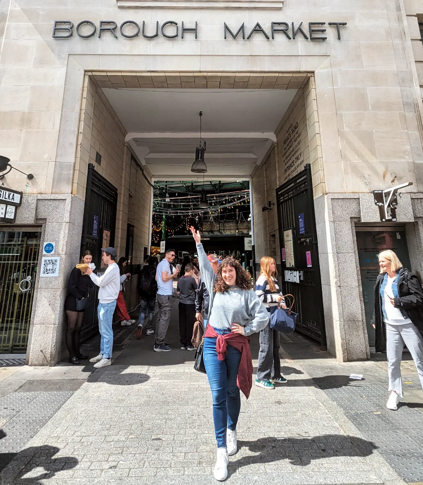 Becca posing in front of Borough Market